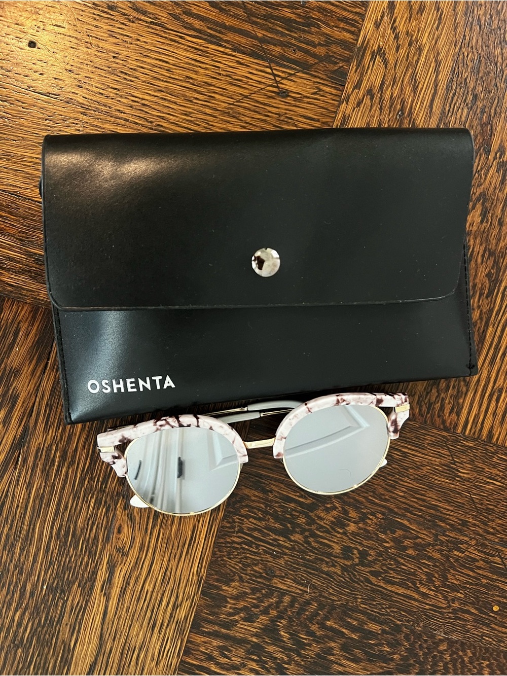Brand new Oshenta Sunglasses with original case and tags